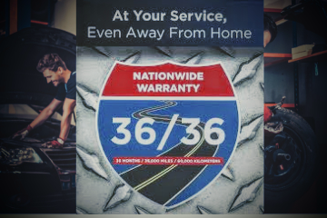 nationwide warranty sign. it says "at your service, even away from home".